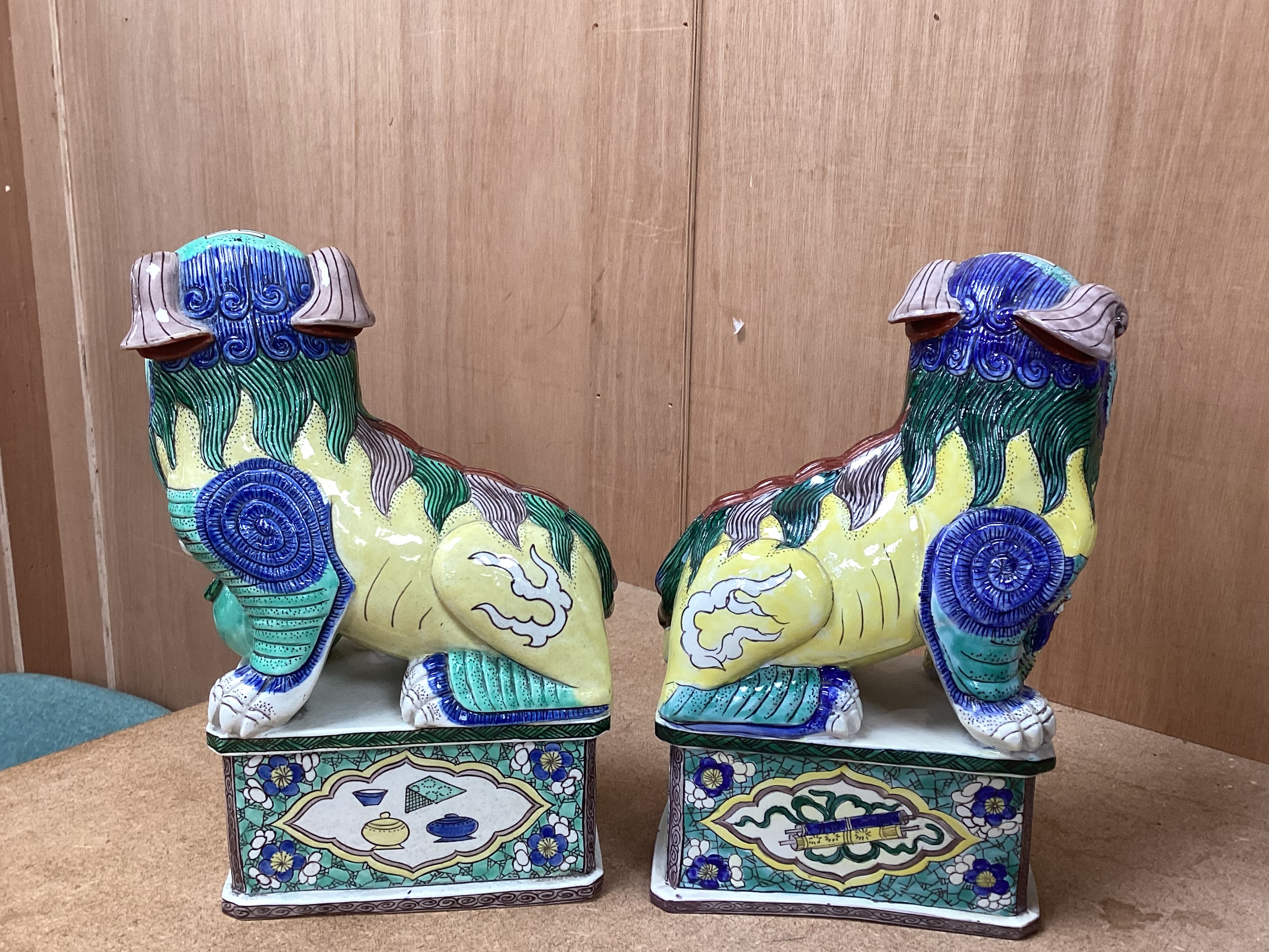 A pair of large 20th century Chinese or Samson enamelled porcelain figures of Buddhist Lions, 24cm